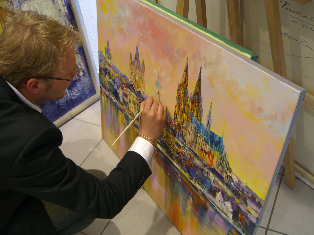 Christian Henze malt in der Galerie Wehr